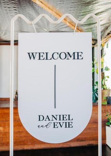 $60 Hire<br>White Arched Acrylic 'Welcome' Sign <br>